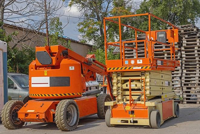 warehouse forklift in action during a busy workday in Millers Falls